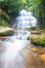 Image showing waterfall and rocks covered with moss