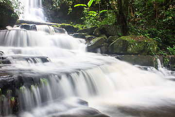 Image showing waterfall and rocks covered with moss