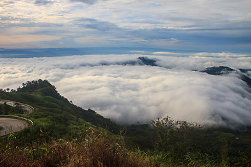 Image showing sea of fog with forests as foreground