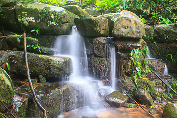 Image showing waterfall and rocks covered with moss