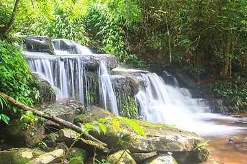 Image showing waterfall and rocks covered with moss