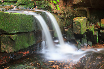 Image showing waterfall and rocks covered with moss