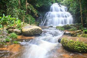Image showing waterfall and rocks covered with moss