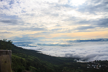 Image showing sea of fog with forests as foreground