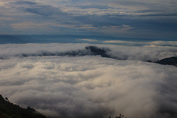 Image showing sea of fog with forests as foreground