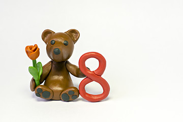 Image showing Plasticine bear with flower and eight figure