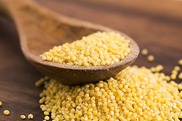 Image showing Millet on wooden spoon