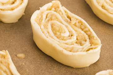 Image showing Puff pastry cookies with apple and cinnamon before baking