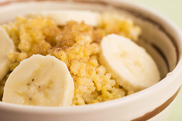 Image showing Fresh millet porridge with banana