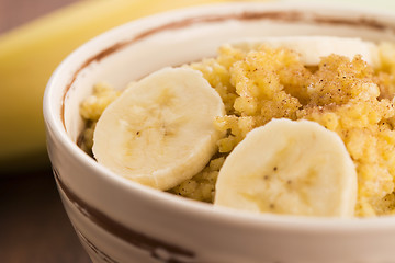 Image showing Fresh millet porridge with banana