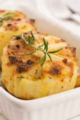 Image showing potato gratin with fresh rosemary