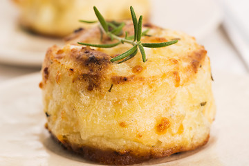 Image showing potato gratin with fresh rosemary