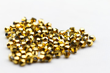 Image showing Golden glass beads