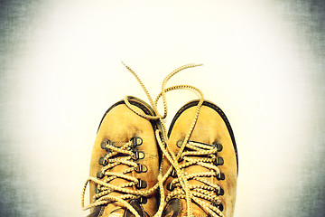 Image showing White background with yellow shoes