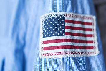 Image showing Stripe of USA flag on shirt sleeve 