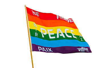 Image showing Rainbow varicolored pacifist flag with multilingual peace text i