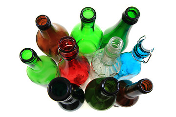 Image showing empty color glass bottles