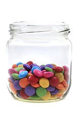 Image showing color round candy in the glass