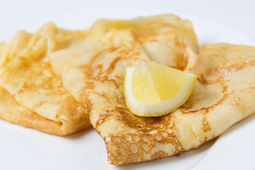 Image showing English pancake and lemon