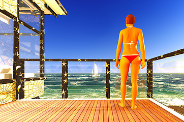 Image showing Woman standing on patio