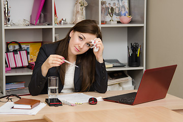 Image showing Diseased girl at work a computer