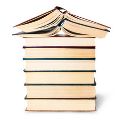 Image showing Stack of six old books with two open top