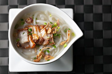 Image showing Thai Noodle Soup with Crispy Pork