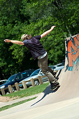 Image showing Skateboarder Riding Skate Ramp