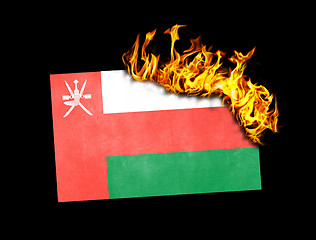 Image showing Flag burning - Oman