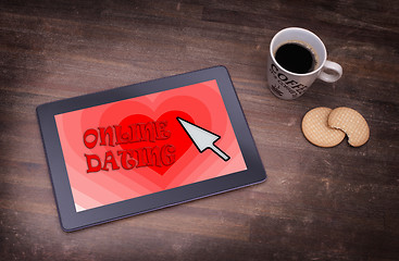 Image showing Online dating on a tablet