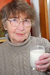 Image showing Woman glass milk