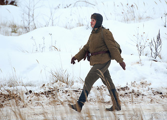 Image showing Woman soldier walking