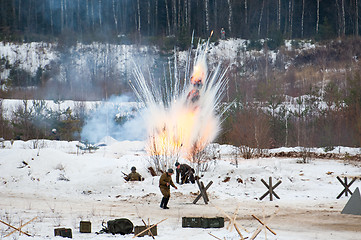 Image showing Soldiers under the explosions