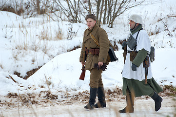 Image showing Two soldiers walking