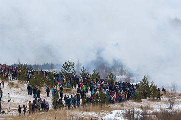 Image showing Civilian spectators of history reenactment