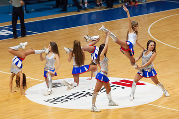 Image showing Cheerleaders dance on basketball arena