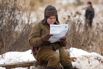 Image showing Reading a newspaper