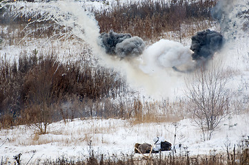 Image showing Soldiers under the explosions