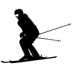 Image showing Mountain skier  speeding down slope. Vector sport silhouette.