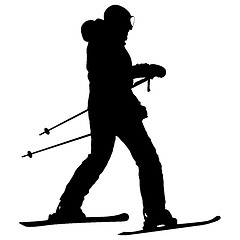 Image showing Mountain skier  speeding down slope. Vector sport silhouette.