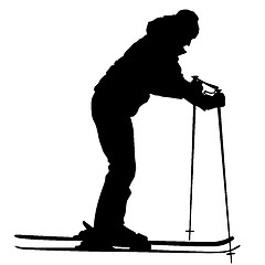 Image showing Mountain skier  speeding down slope. Vector sport silhouette.