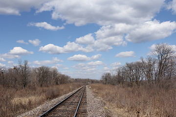 Image showing Railway to horizon and clouds on the sky background.