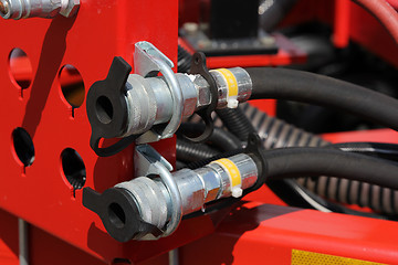 Image showing Hydraulic connectors. Agricultural machinery