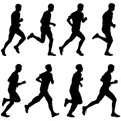 Image showing Set of silhouettes. Runners on sprint, men. vector illustration.