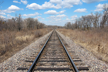 Image showing Railway to horizon and clouds on the sky background.