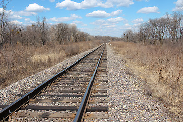 Image showing Railway to horizon and clouds on the sky background.
