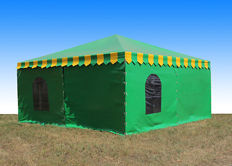 Image showing Green very big  tent in the field