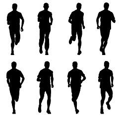 Image showing Set of silhouettes. Runners on sprint, men. vector illustration.