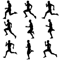 Image showing Set of silhouettes. Runners on sprint, men. vector illustration.