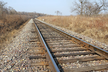 Image showing Railway to horizon and clouds on the sky background.